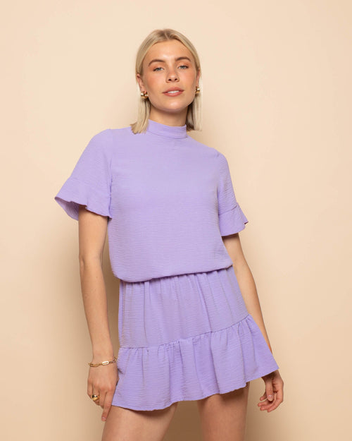 JULIE RUFFLE TOP LILA